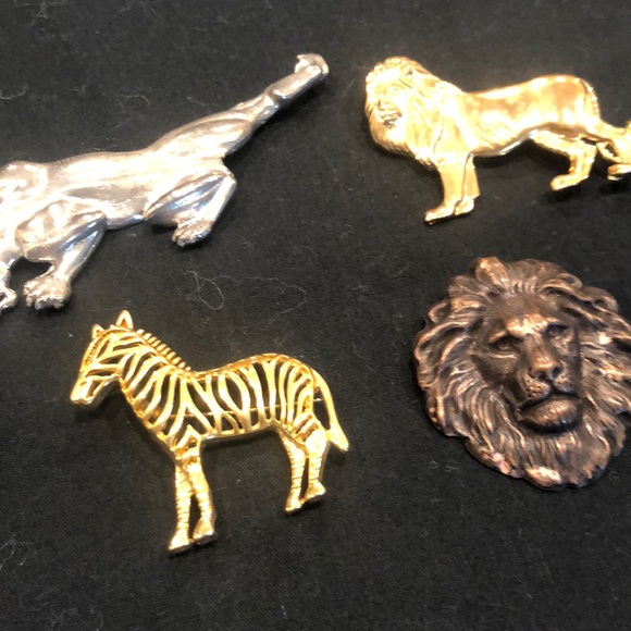 Jewelry - Lot of 4 brooch’s Lion, zebra,and cougar